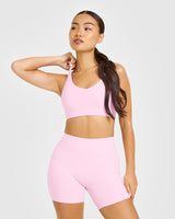 SoftMotion™ Sports Bra with White Logo | Chalk Pink