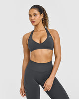 Effortless Seamless Halter Neck Sports Bra with White Logo | Coal
