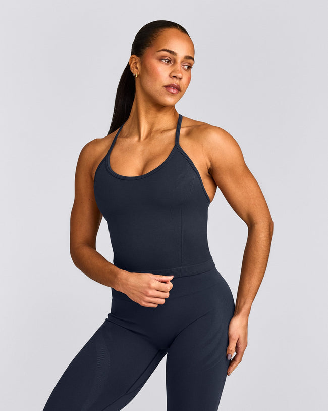 EnhanceLift™ Seamless Strappy Racer Tank Top with Built in Bra Shelf with Gray Logo | True Blue