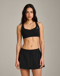 EasyLift™ Cross Back Sports Bra with Grey Logo | Black