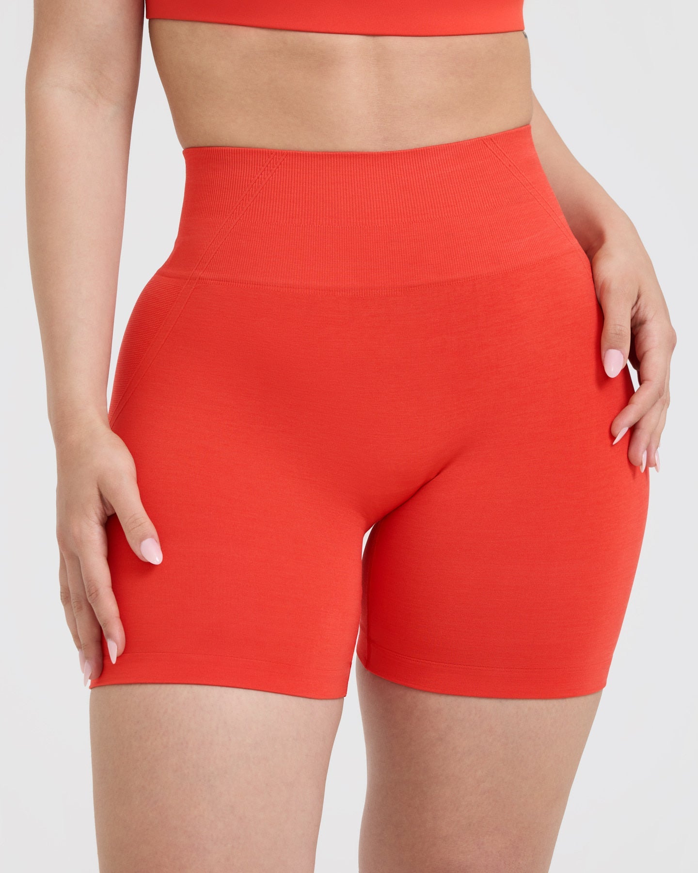 EffortlessLift™ Seamless Shorts with White Logo | Charged Orange