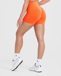 EffortlessLift™ Seamless Shorts with White Logo | Tangerine Orange