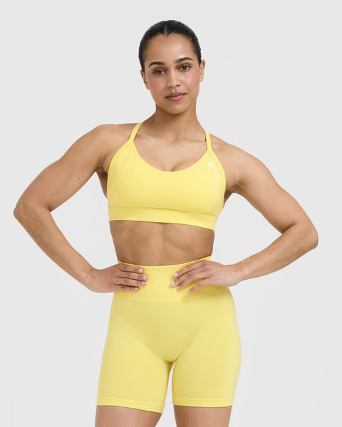 Action Logo Sports Bra - Faded Yellow/Black