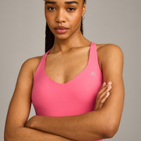UnifiedMove™ V Neck Cross Back Vest with Reflective Logo | Hot Girl Pink