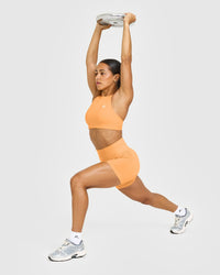 EffortlessLift™ Seamless Shorts with White Logo | Powdered Orange