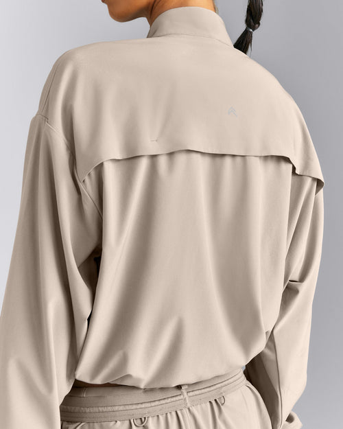 AirMove™ 1/2 Zip Jacket with Bonding | Warm Sand
