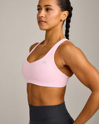 EasyLift™ Cross Back Sports Bra with Grey Logo | Chalk Pink