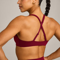 EasyLift™ Cross Back Sports Bra with Grey Logo | Ruby Red