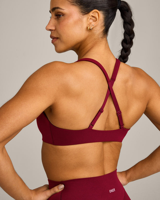 EasyLift™ Cross Back Sports Bra with Grey Logo | Ruby Red