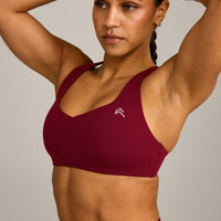 EasyLift™ Cross Back Sports Bra with Grey Logo | Ruby Red