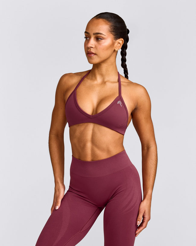 EnhanceLift™ Seamless Minimal Halter Neck Bralette with Gray Logo | Burnt Maroon