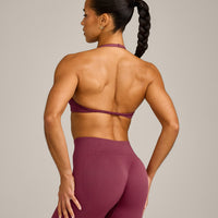 EnhanceLift™ Seamless Minimal Halter Neck Bralette with Grey Logo | Burnt Maroon