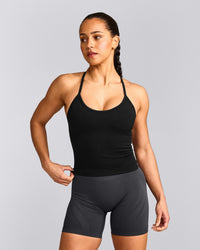 EnhanceLift™ Seamless Strappy Racer Vest with Built in Bra Shelf with Grey Logo | Black
