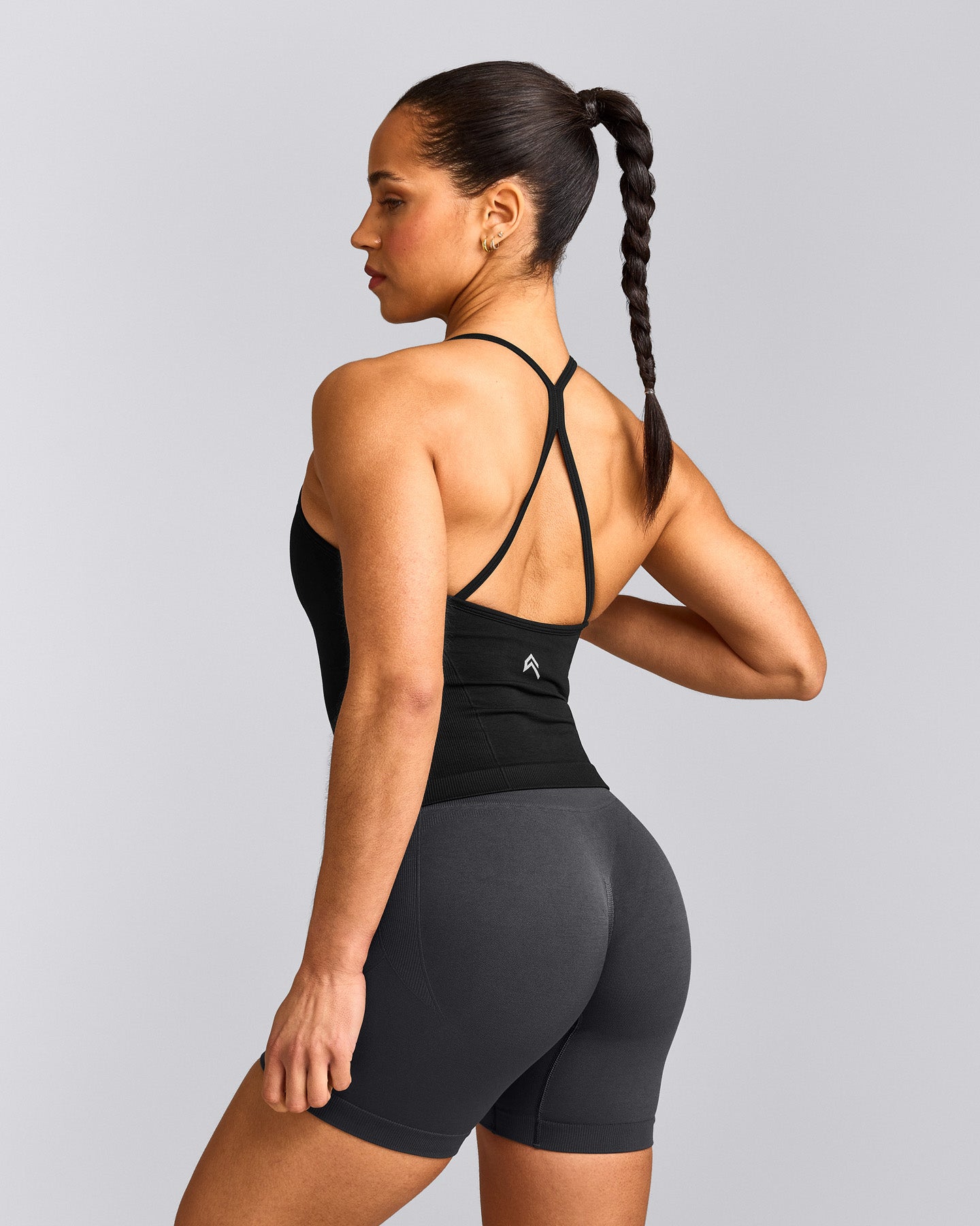 EnhanceLift™ Seamless Strappy Racer Vest with Built in Bra Shelf with Grey Logo | Black