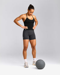 EnhanceLift™ Seamless Strappy Racer Vest with Built in Bra Shelf with Grey Logo | Black