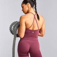EnhanceLift™ Seamless Strappy Racer Tank Top with Built in Bra Shelf with Gray Logo | Burnt Maroon Red