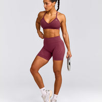 EnhanceLift™ Seamless Strappy Sports Bra with Gray Logo | Burnt Maroon Red