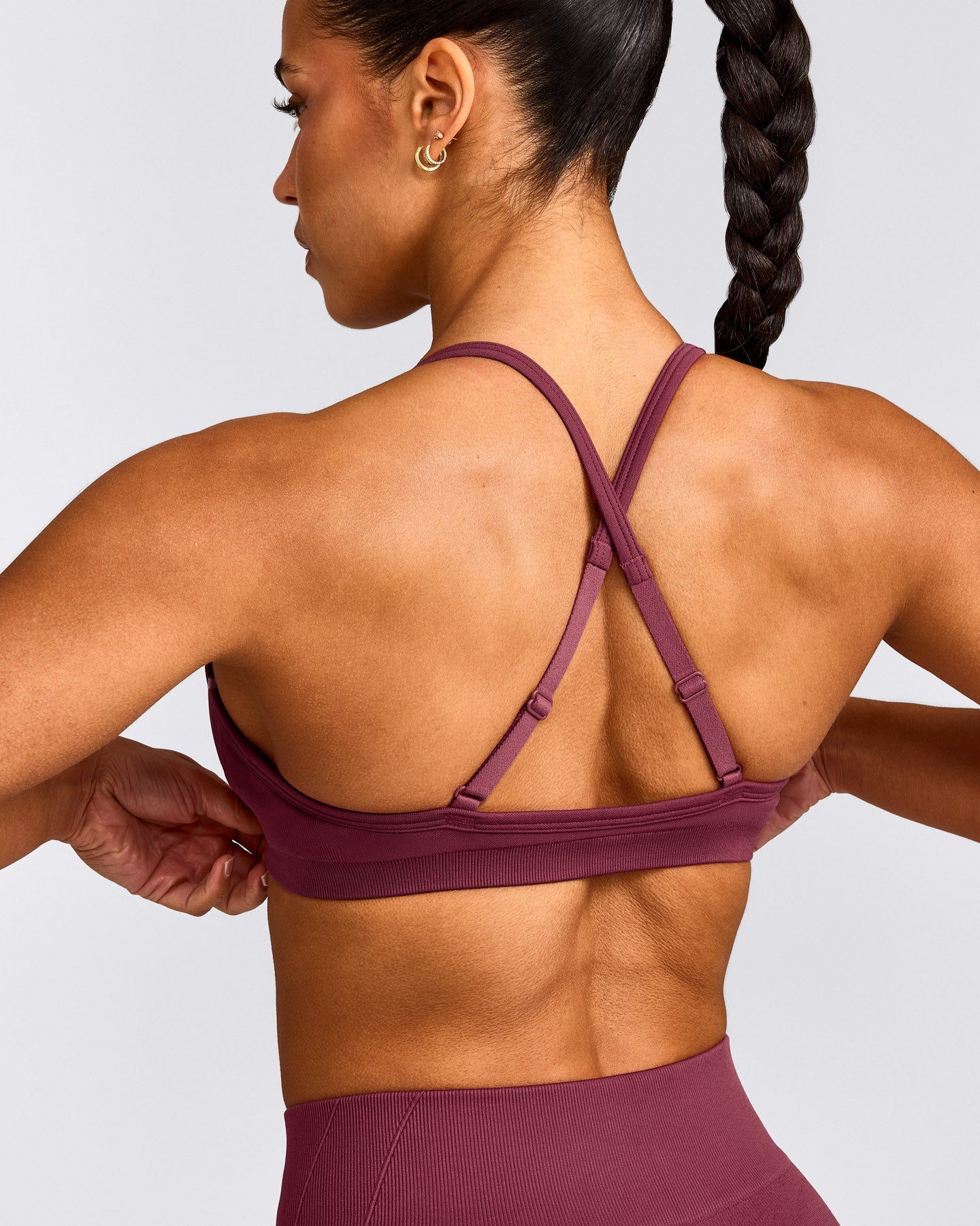 EnhanceLift™ Seamless Strappy Sports Bra with Gray Logo | Burnt Maroon Red