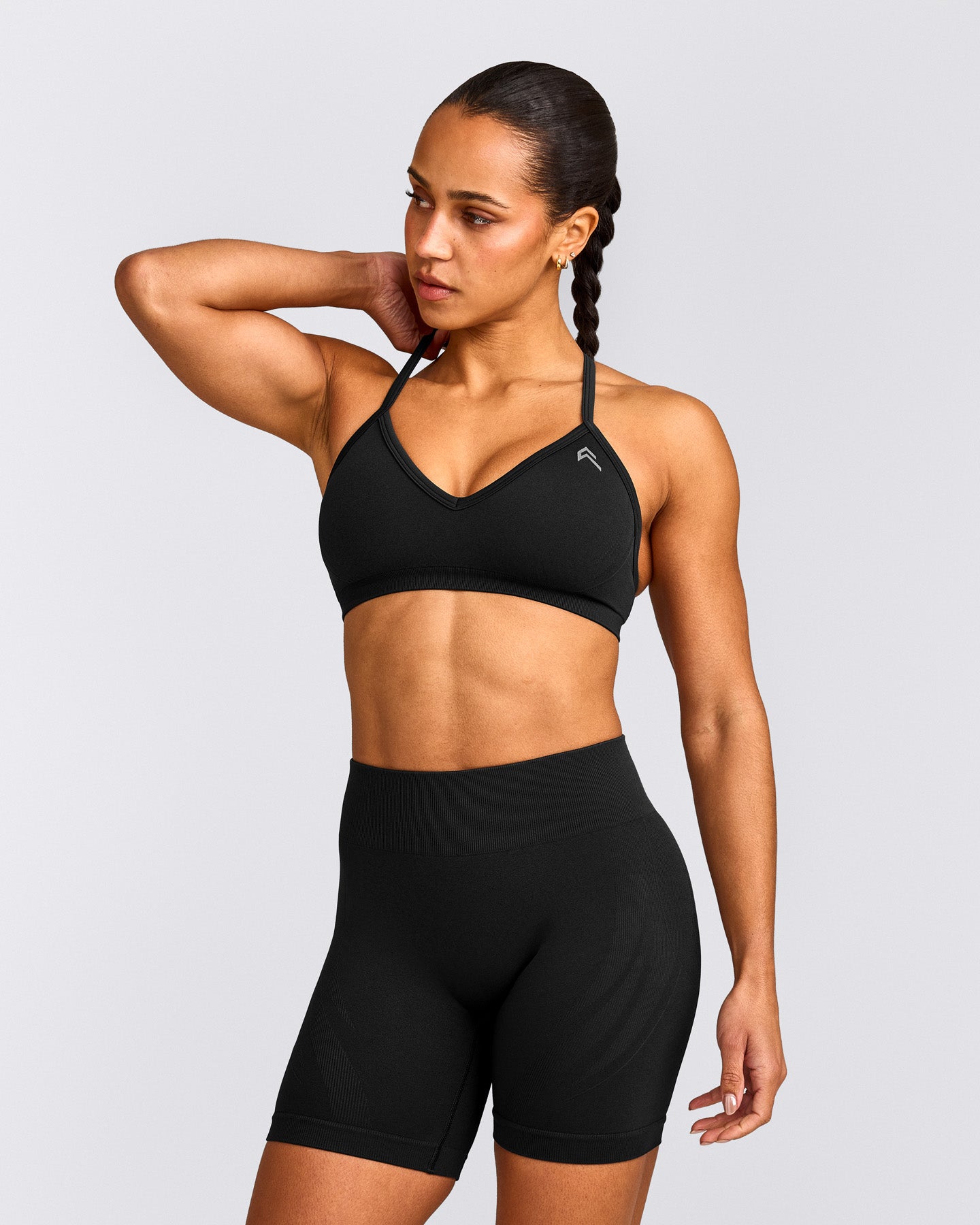 EnhanceLift™ Seamless Strappy Sports Bra with Gray Logo | Black