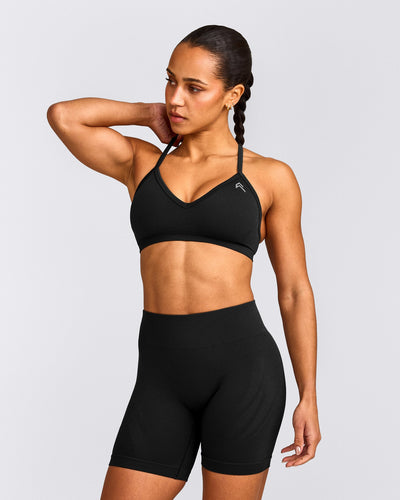 EnhanceLift™ Seamless Strappy Sports Bra with Gray Logo | Black