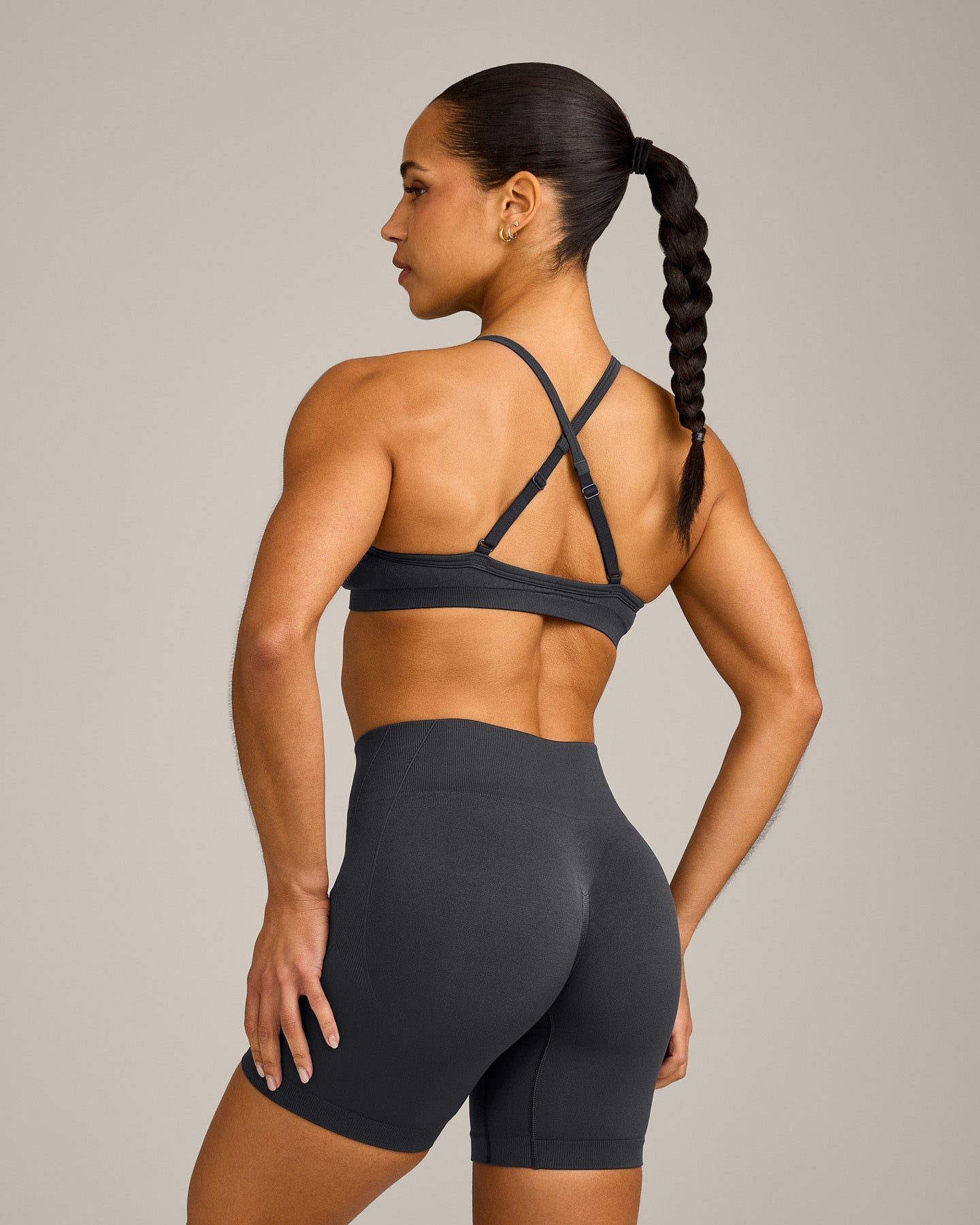 EnhanceLift™ Seamless Strappy Sports Bra with Grey Logo | Coal