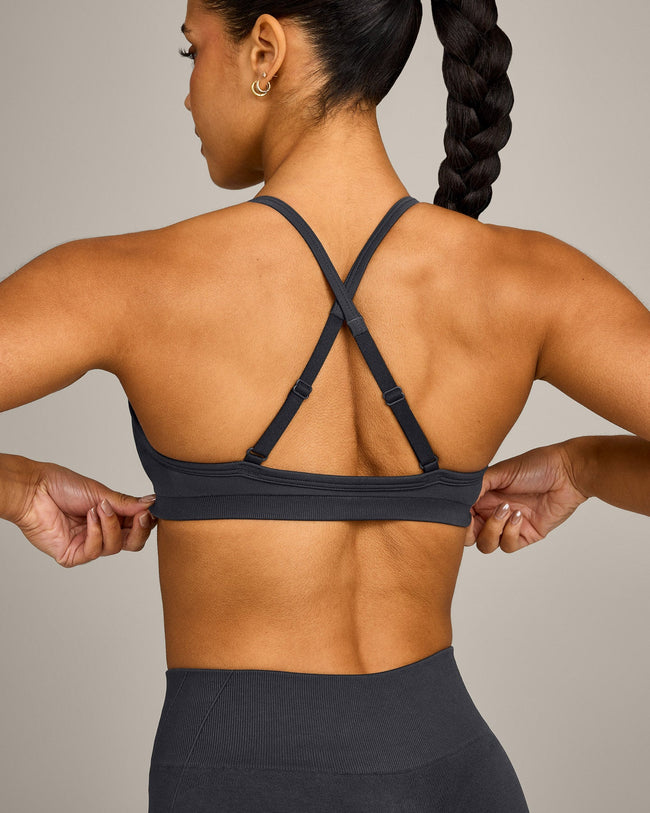 EnhanceLift™ Seamless Strappy Sports Bra with Grey Logo | Coal