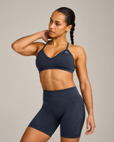 EnhanceLift™ Seamless Strappy Sports Bra with Grey Logo | True Blue