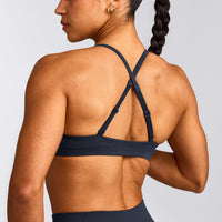 EnhanceLift™ Seamless Strappy Sports Bra with Gray Logo | True Blue