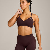 EnhanceLift™ Seamless Strappy Sports Bra with Grey Logo | Plum Brown