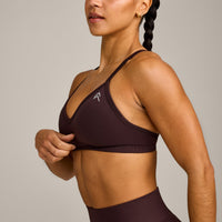 EnhanceLift™ Seamless Strappy Sports Bra with Grey Logo | Plum Brown