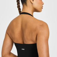 SoftMotion™ Halter Neck Mid Vest with Built in Bra Shelf with White Logo | Black