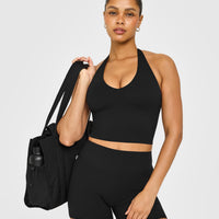 SoftMotion™ Halter Neck Mid Vest with Built in Bra Shelf with White Logo | Black