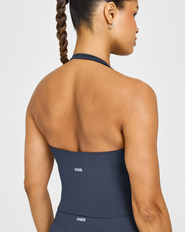 SoftMotion™ Halter Neck Mid Vest with Built in Bra Shelf with White Logo | True Blue