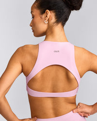 SoftMotion™ High Neck Sports Bra with Gray Logo | Chalk Pink