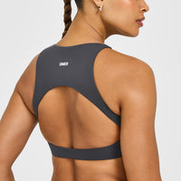 SoftMotion™ High Neck Sports Bra with White Logo | Coal