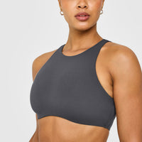 SoftMotion™ High Neck Sports Bra with White Logo | Coal
