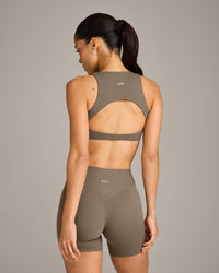 SoftMotion™ High Neck Sports Bra with Grey Logo | Moss Brown