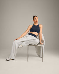 SoftMotion™ High Neck Sports Bra with Grey Logo | True Blue