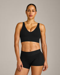 SoftMotion™ Longline Sports Bra with Grey Logo | Black