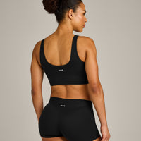 SoftMotion™ Longline Sports Bra with Grey Logo | Black