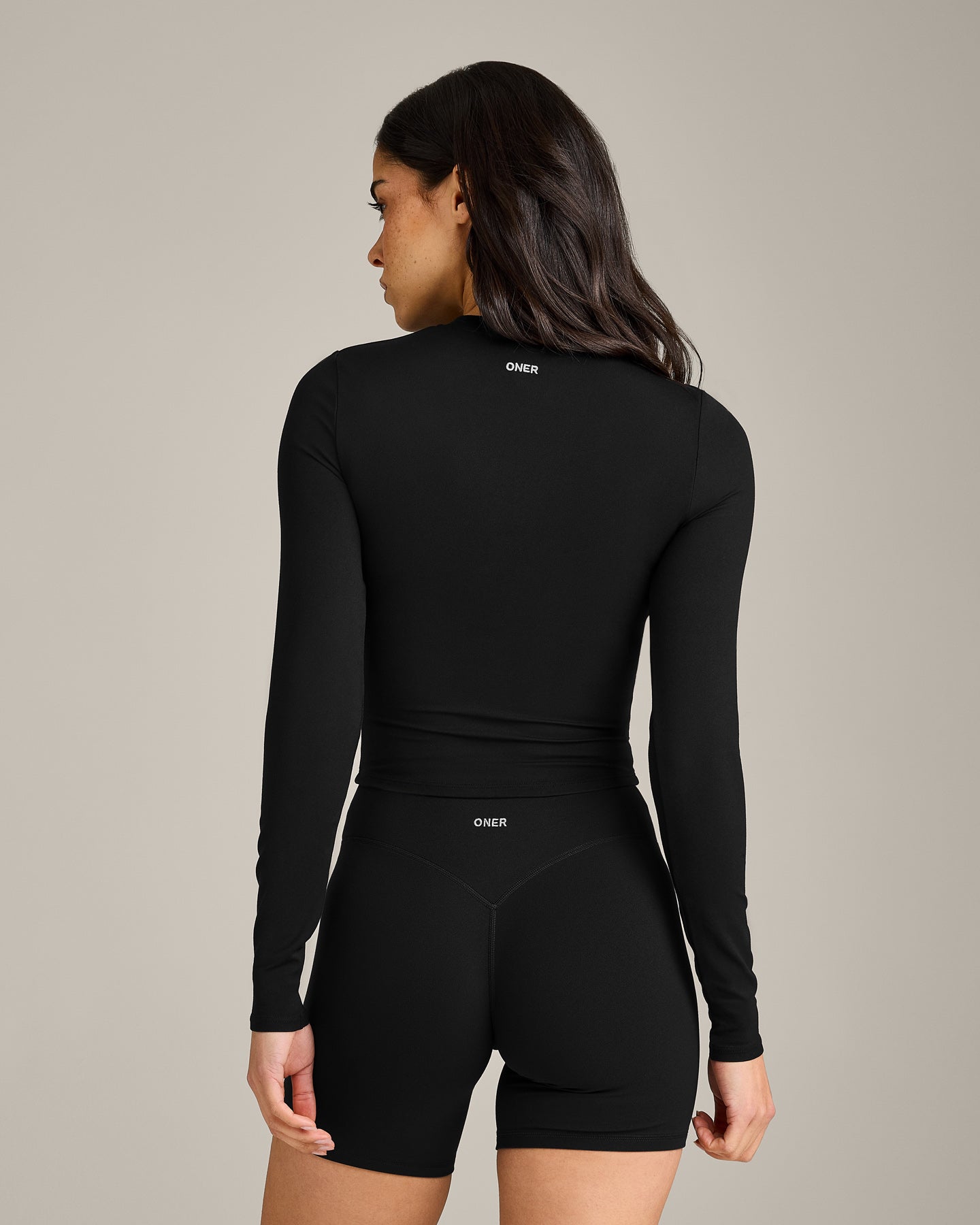 SoftMotion™ Long Sleeve Mid Top with Grey Logo | Black