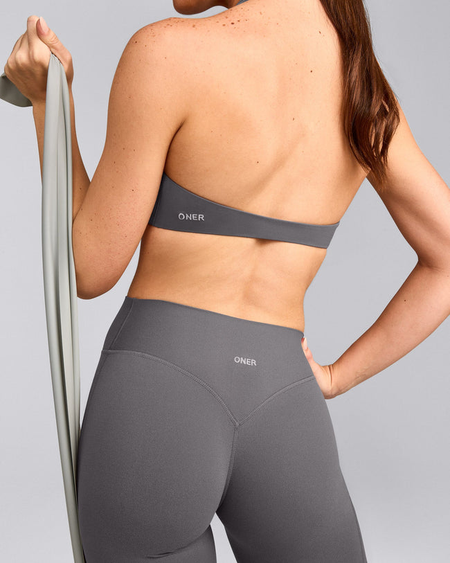 SoftMotion™ Minimal Halter Neck Bralette with Gray Logo | Ash Gray