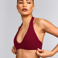 SoftMotion™ Minimal Halter Neck Bralette with Grey Logo | Ruby Red