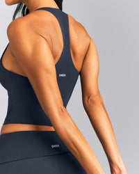 SoftMotion™ Racer Back Mid Tank Top with Built in Bra Shelf New Branding | True Blue