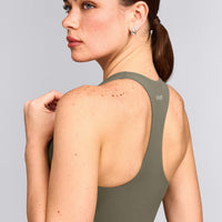 SoftMotion™ Racer Back Vest with Built in Bra Shelf with Grey Logo | Alpine Green