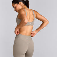 SoftMotion™ Scoop Back Bralette with White Logo | Warm Sand