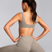 SoftMotion™ Scoop Back Bralette with White Logo | Warm Sand