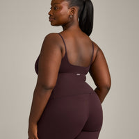 SoftMotion™ Strappy Mid Vest with Built in Bra Shelf with Grey Logo | Plum Brown