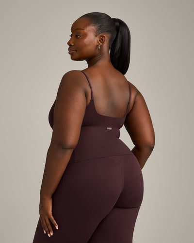 SoftMotion™ Strappy Mid Vest with Built in Bra Shelf with Grey Logo | Plum Brown