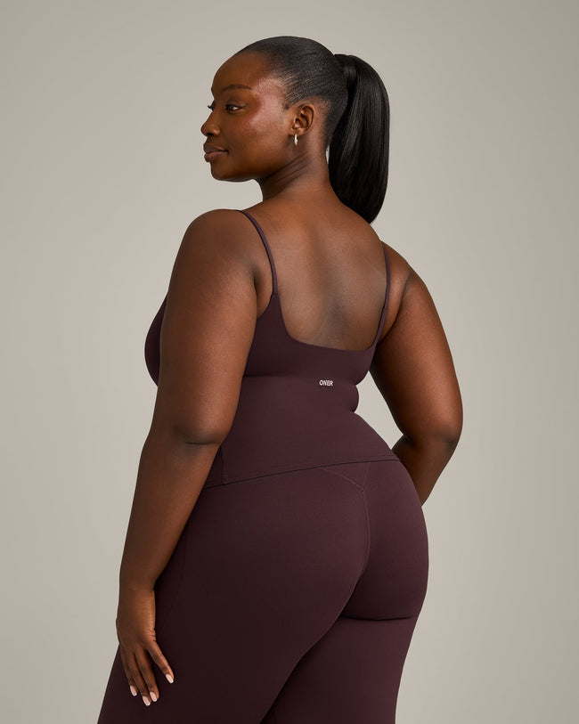 SoftMotion™ Strappy Mid Vest with Built in Bra Shelf with Grey Logo | Plum Brown